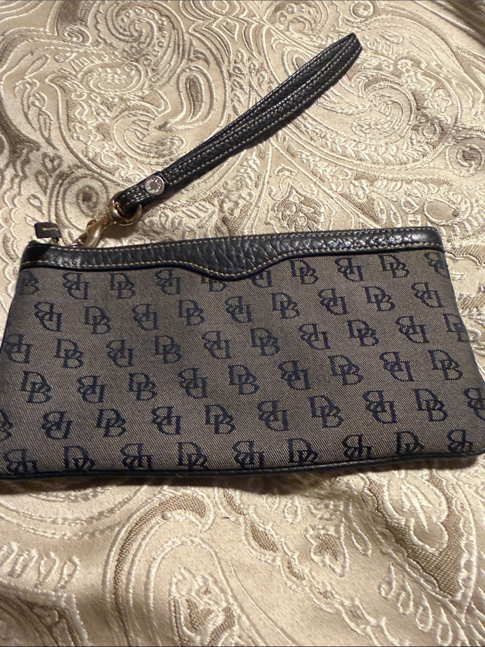 Dooney & Bourke Black and Tan Logo Wristlet